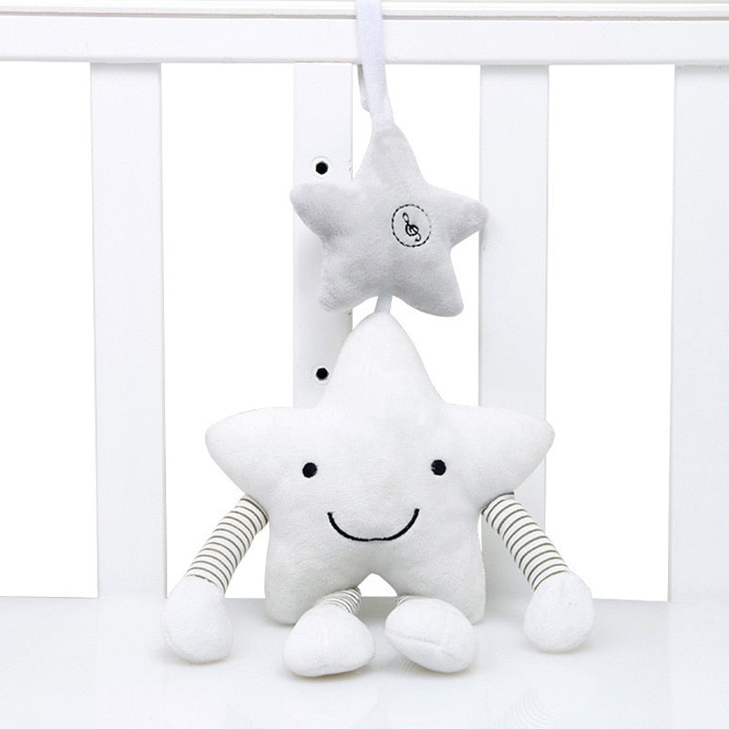 Musical star rattle toy hanging from a stroller - BabyGroove